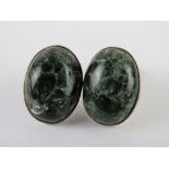 A pair of silver and green agate stud earrings, stamped 925, with butterfly backs,