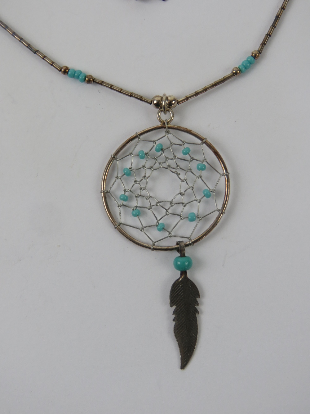 A Native American dream catcher necklace, Navajo style, stamped 925 to the clasp. - Image 2 of 3