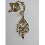 A 9ct gold pendant having filigree bale on 9ct gold chain, hallmarked 375,