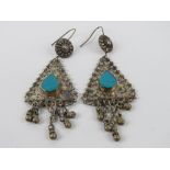 A pair of large silver earrings having central turquoise coloured teardrop panel, stamped 925, 8.