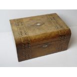 An antique walnut stationery box having inlaid mother of pearl and boxwood to front and lid