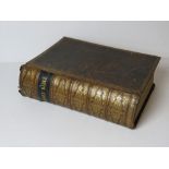 A late 19th century leather bound Family Bible, 40 x 31 x 11cm.