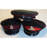 Two British Visor caps and a soviet cap,