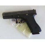 A deactivated Glock 17 9mm second genera