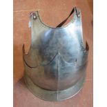 Decorative armour plate with straps.