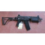 A deactivated Micro Galil 5.56mm MAR ass