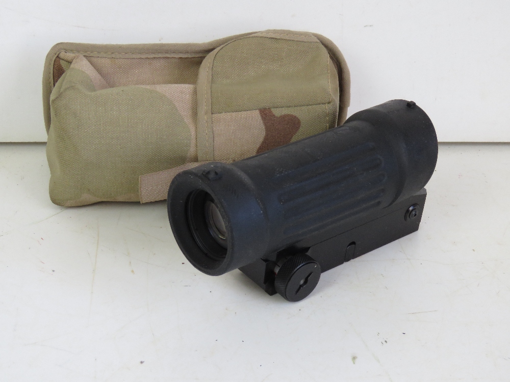 An ELCAN 4x reticle scope with Picatinny