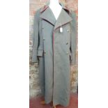 A Russian Great Coat complete with butto