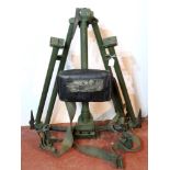 A DISA Tripod with carry straps.