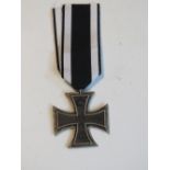 A reproduction WWI German Iron Cross wit