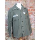 A US Army olive green wool field shirt a