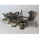 A quantity of silver plated wares including teapot with wicker wrapped handle,