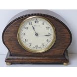 A Swiss made mantle clock having eight-day movement,