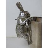 A silver painted rabbit wine cooler decoration, as new with tag.