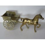 An articulated brass figurine of a horse and cart approx 27cm in length.