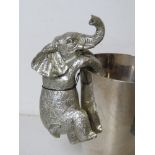 A silver painted elephant wine cooler decoration, as new with tag.