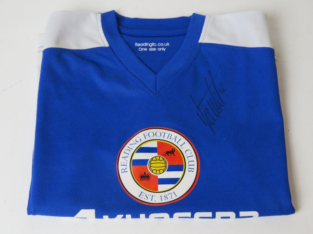 An autographed Reading Football Club t-shirt, child size.