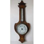 An inlaid mahogany Edwardian aneroid barometer with thermometer over.