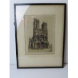 A signed print of a W Watson sketch of Notre Dame, framed and glazed.