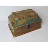 A wooden casket type table top box.