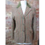 A ladies tweed jacket size 12.