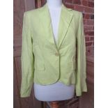 A 100% linen ladies jacket in lime green