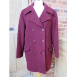 A ladies 70% wool, 10% cashmere coat in burgundy size 14 by Debenhams.