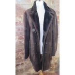 A brown leather mouton (sheepskin) coat