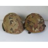 A 1970 US M1 helmet with chin strap and