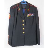 A US Marine Corp tunic and blue trousers