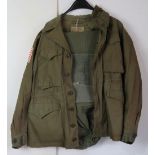 A WWII US M-1943 Airborne jacket and Air