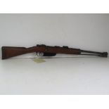 A deactivated Carcano M91 6.5mm rifle, s