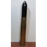 An inert 105mm TK HESD shell, the case d