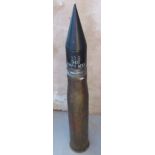 An inert WWII 90mm G Shot HVAP-T shell,