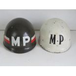 A 1970s US M1 MP helmet liner and a 1955