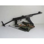 A deactivated PPS-43 SMG and accessories