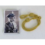 A set of Third Reich political leader cap cords and copy photographic print.
