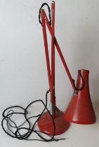 A vintage red metal angle poise lamp, sl