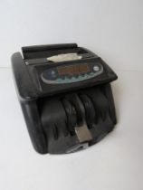 A bank note counter model WJD-ST856.