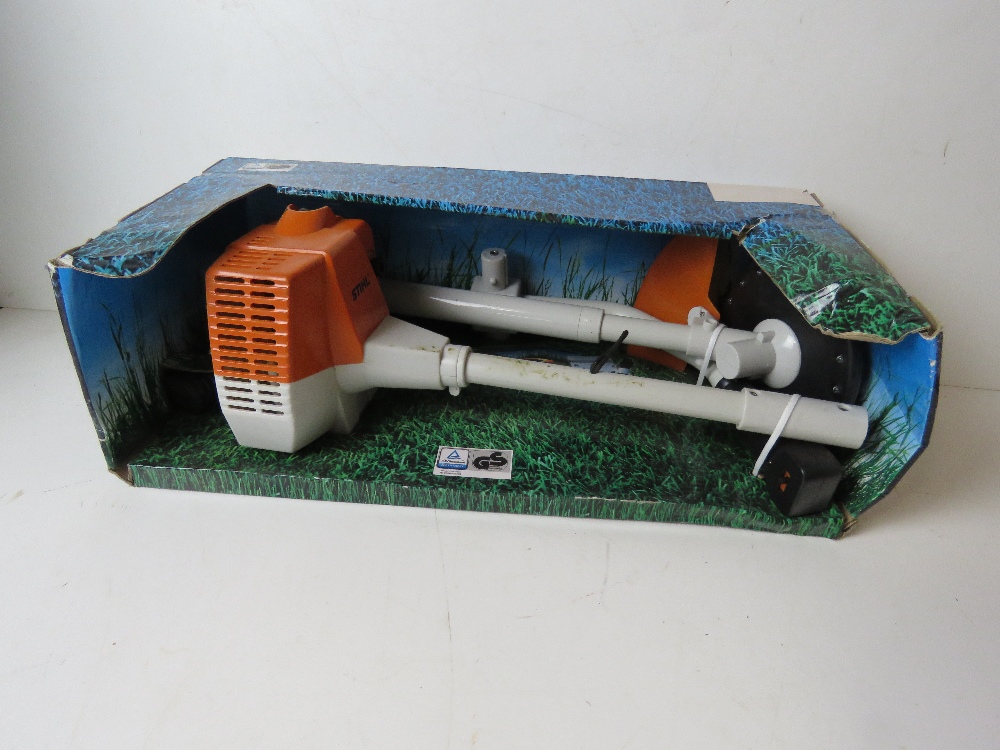 A small Stihl strimmer in box.