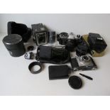 Camera equipment inc a Yashica FX7 camer