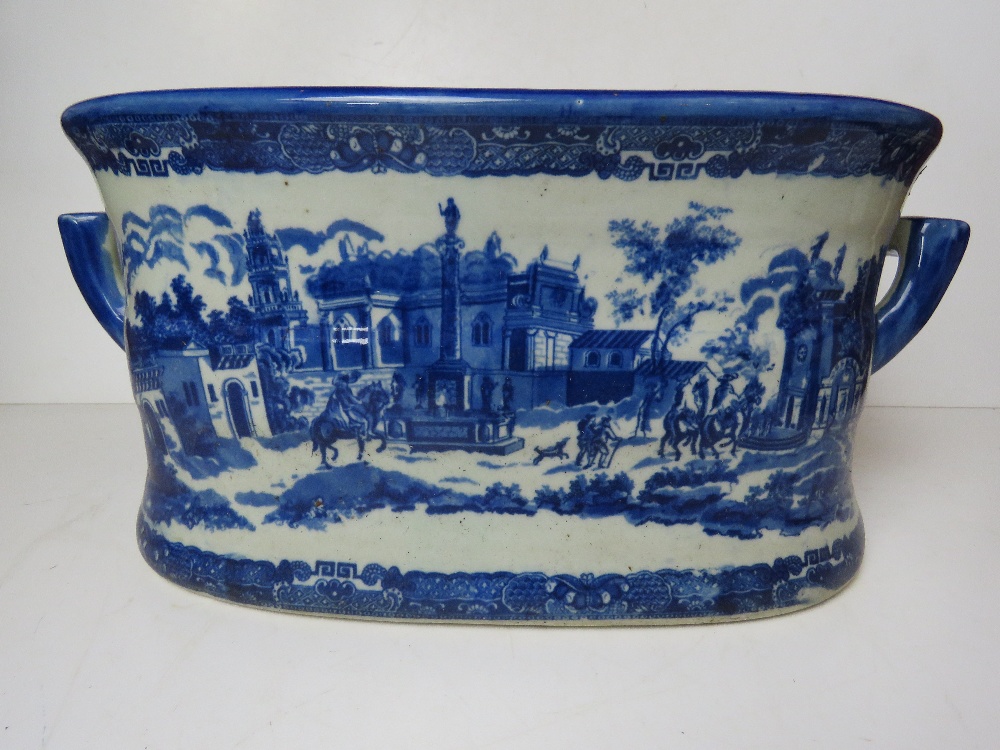 A large blue and white planter, blue glaze, Italian style city scenes upon. - Image 3 of 4