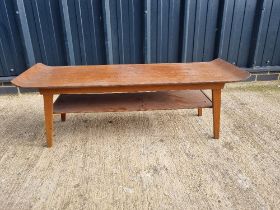 A mid 20thC low coffee table.