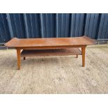 A mid 20thC low coffee table.