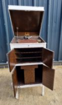 A HMV model 162 gramophone in cabinet, later shabby chic white painted.