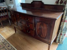 A good Edwardian bow fronted sideboard.