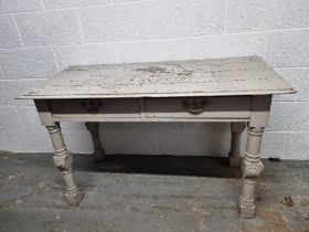A grey painted hall table having twin drawers and measuring 124 x 61cm x 75.5cm.