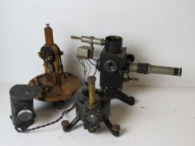 Four experimental scientific instruments including; an antique disappearing-filament pyrometer,