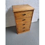 A bedside chest of five drawers, each drawer having brass drop handle measuring approx. 46 x 36.