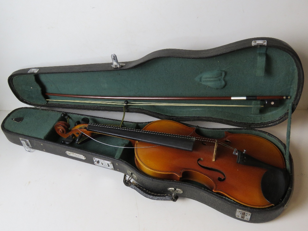 A Chinese violin Skylark Grand in case.